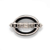 ART DECO, ONYX AND DIAMOND BUCKLE BROOCH