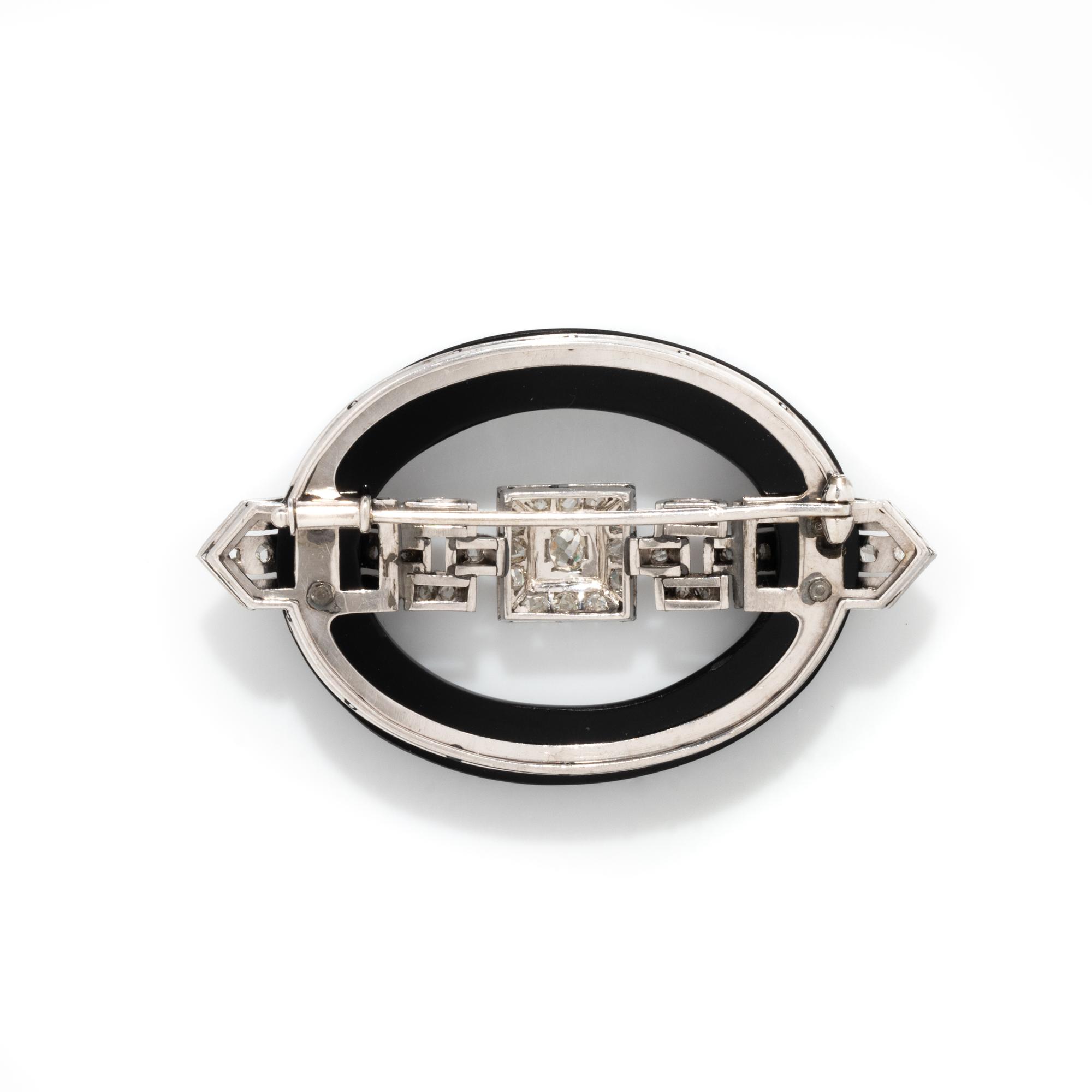 ART DECO, ONYX AND DIAMOND BUCKLE BROOCH