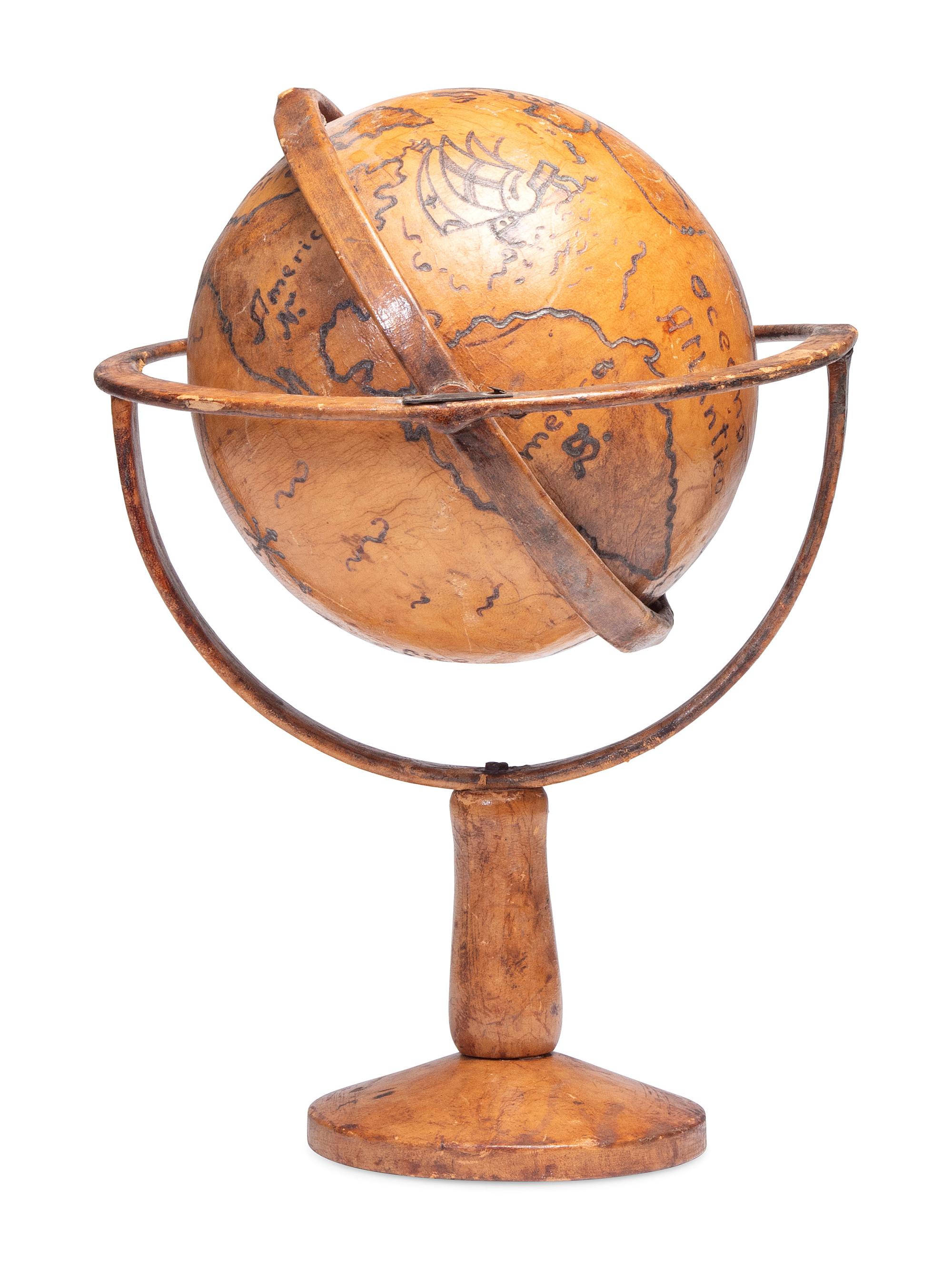 A Folk Art Painted Leather Covered Tabletop Globe