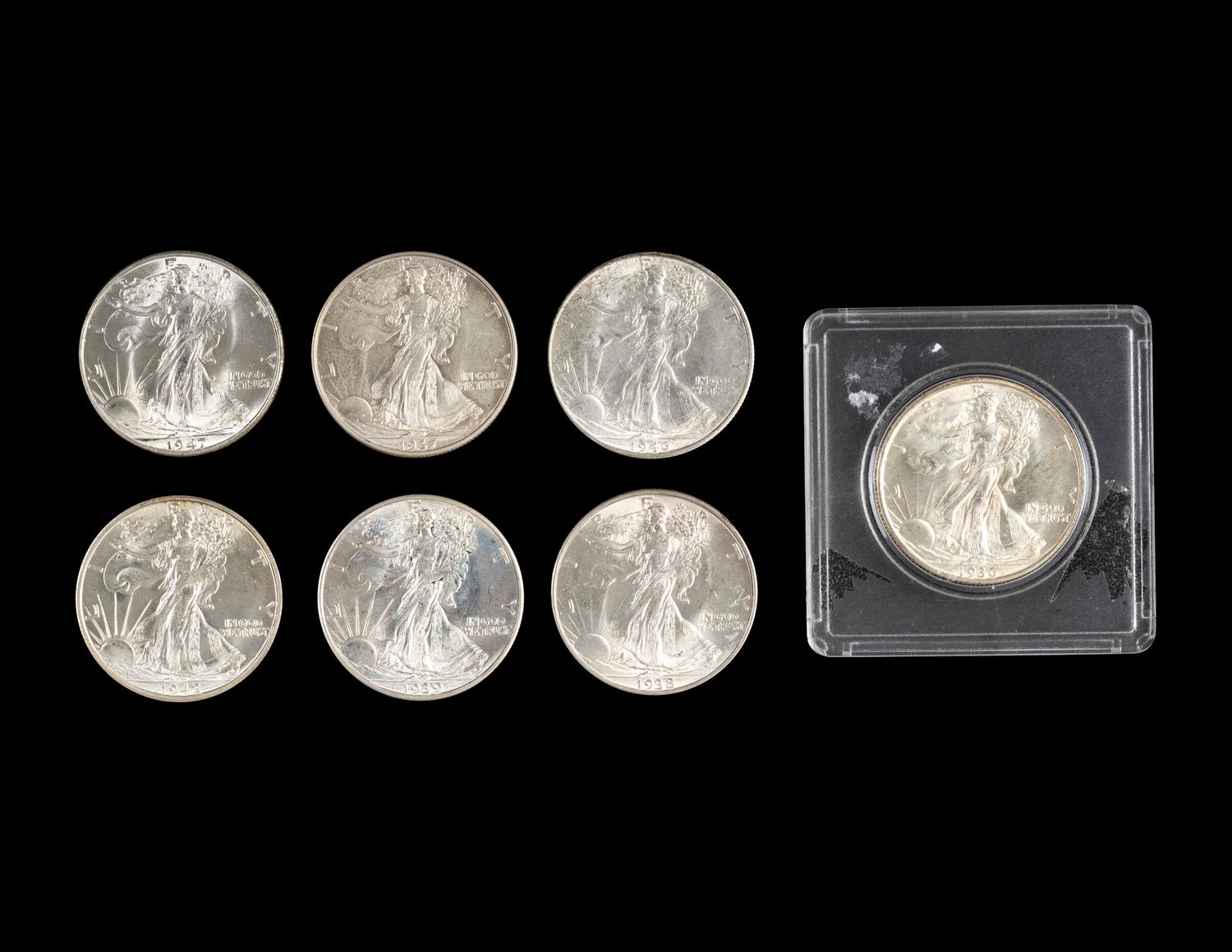 A Group of Seven Walking Liberty 50c Coins