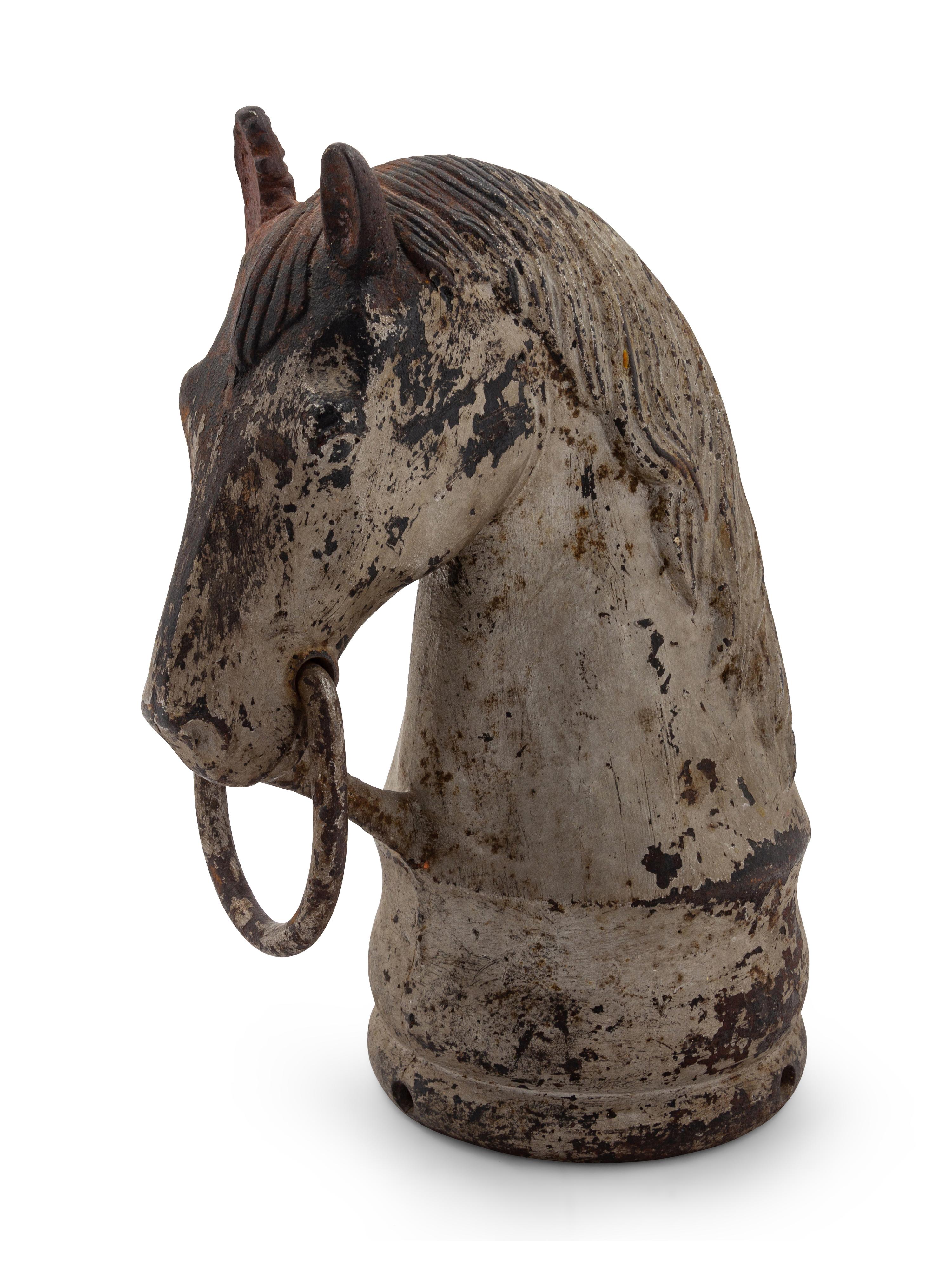 A Cast Iron Horsehead Hitching Post