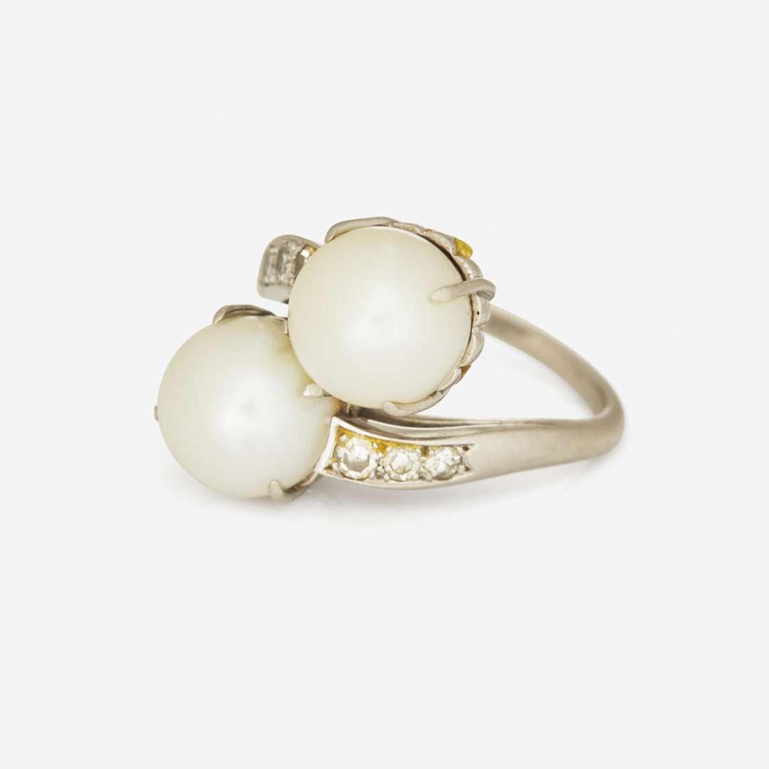 A Platinum, Cultured Pearl, and Diamond Ring