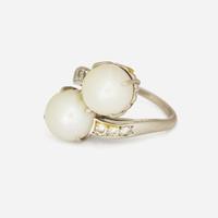 A Platinum, Cultured Pearl, and Diamond Ring