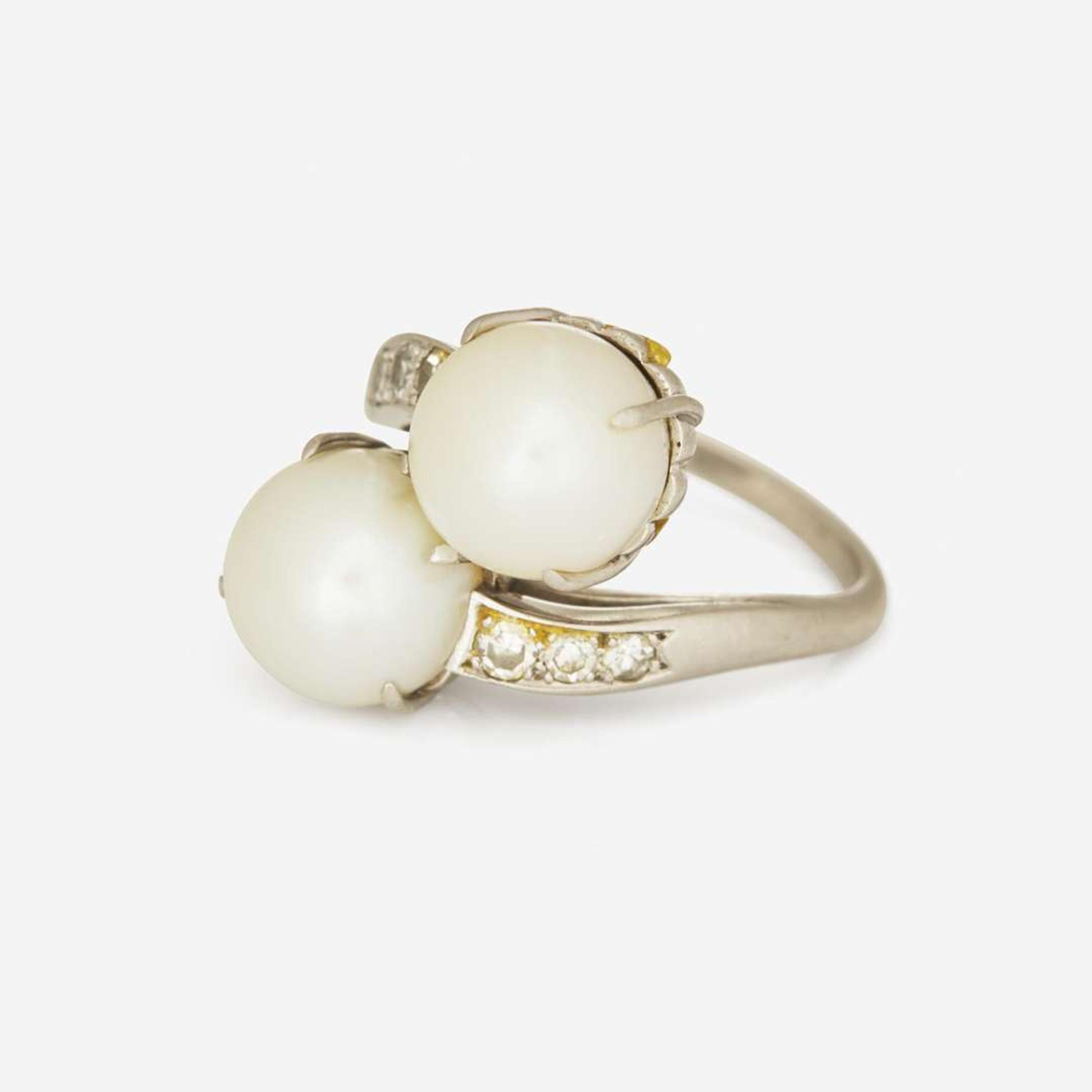 A Platinum, Cultured Pearl, and Diamond Ring
