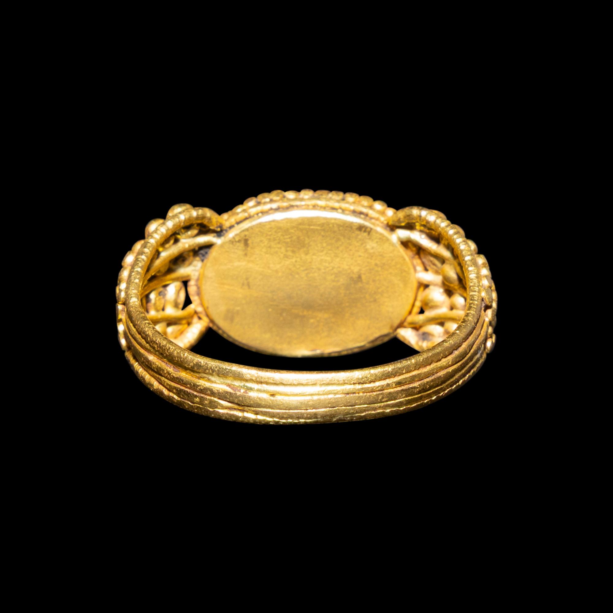 A Late Roman Gold and Carnelian Ring with an Ant Carrying an Ear of Wheat