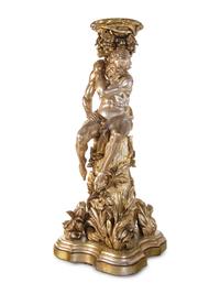 A Pair of Monumental Italian Baroque Style Gilt and Silvered Composition Figural Pedestals