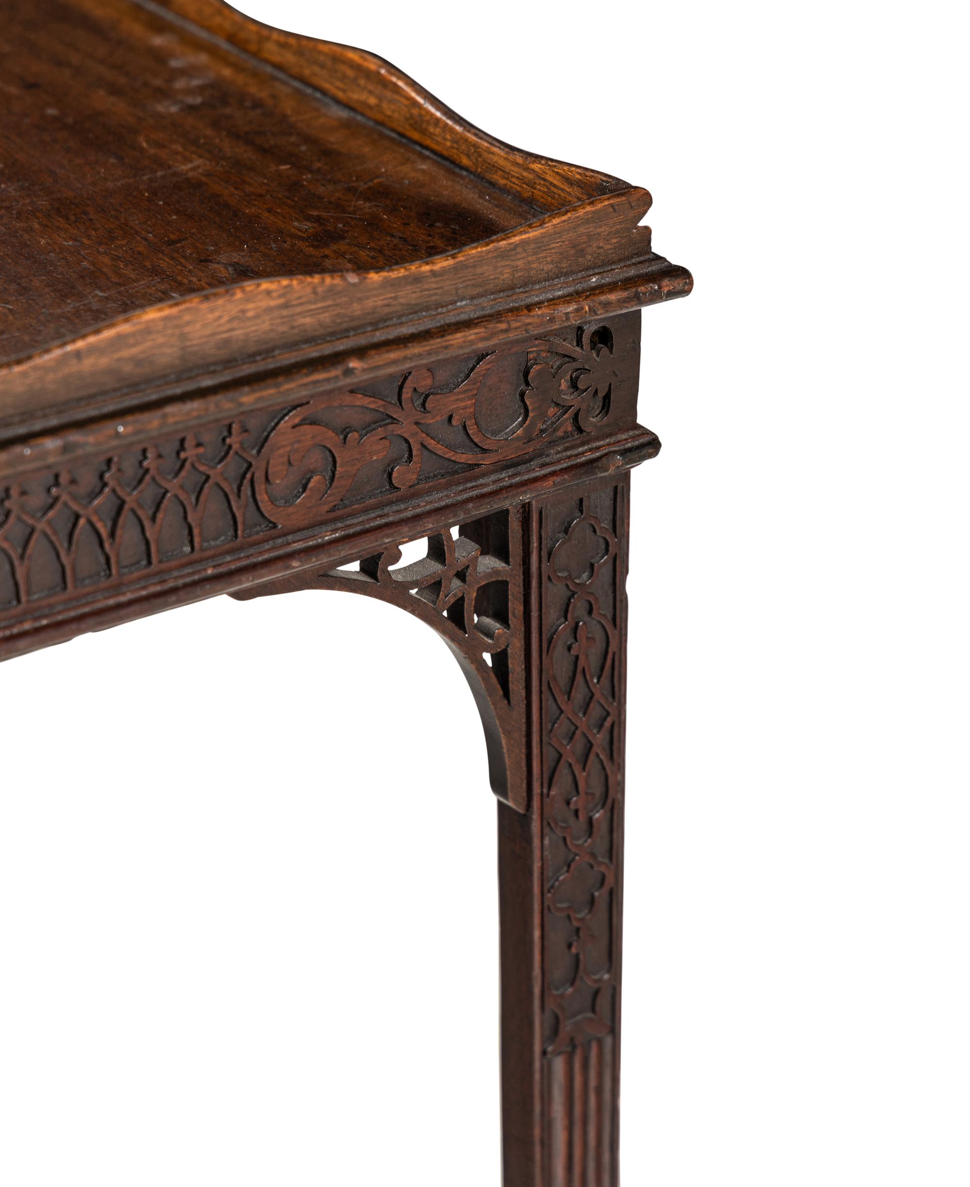 A George III Blind Fret-Carved Mahogany Silver Table