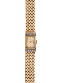 BULOVA, 14K YELLOW GOLD AND DIAMOND WRISTWATCH