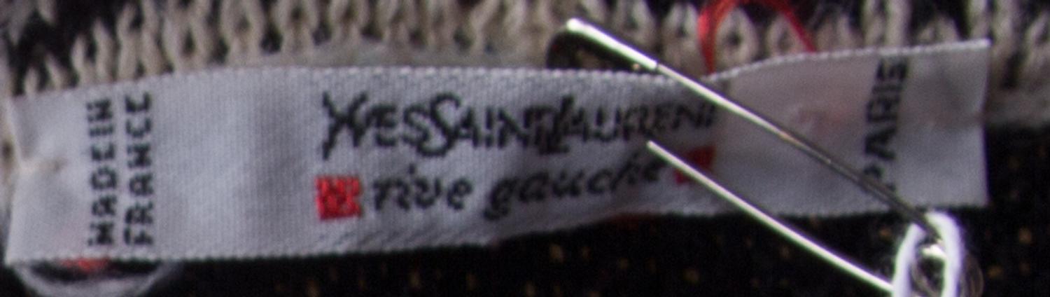 An Yves Saint Laurent Cream Wool Knit Jacket, Size 36.