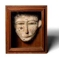 An Egyptian Polychrome Mummy Mask