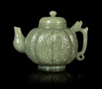 A Celadon Jade Teapot and Cover Height 5 1/4 inches. — LATE 19TH CENTURY/20TH CENTURY