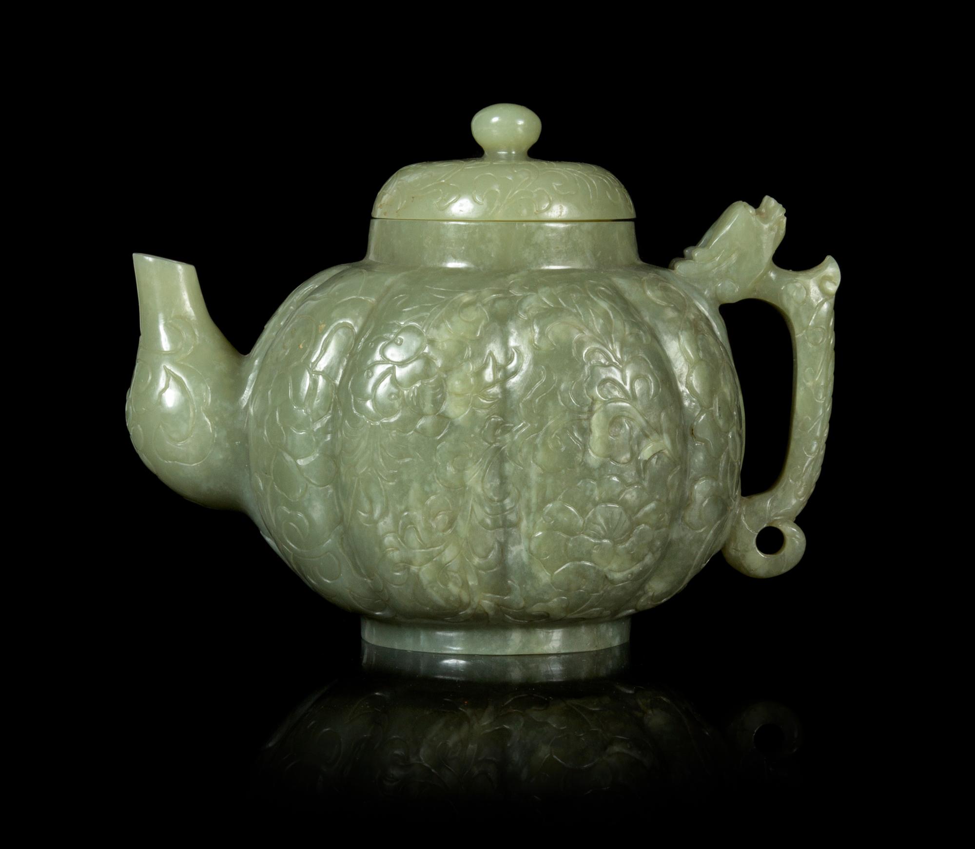 A Celadon Jade Teapot and Cover Height 5 1/4 inches. — LATE 19TH CENTURY/20TH CENTURY