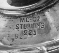 A Continental Silver Spice Tower, 20th Century, of castle form with three spires and raised on a trumpet base.