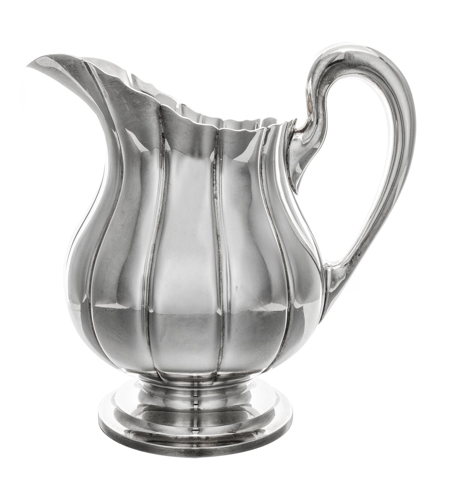 An American Silver Water Pitcher, Worden-Munnis Co., Boston, MA, in the Dublin pattern.