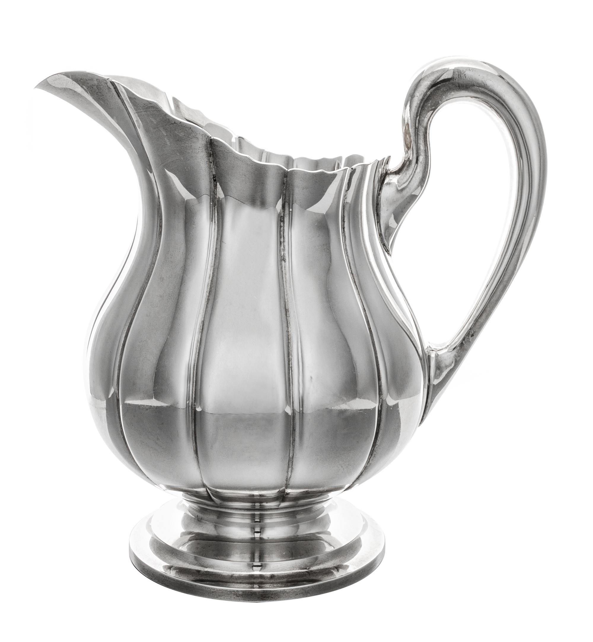 An American Silver Water Pitcher, Worden-Munnis Co., Boston, MA, in the Dublin pattern.