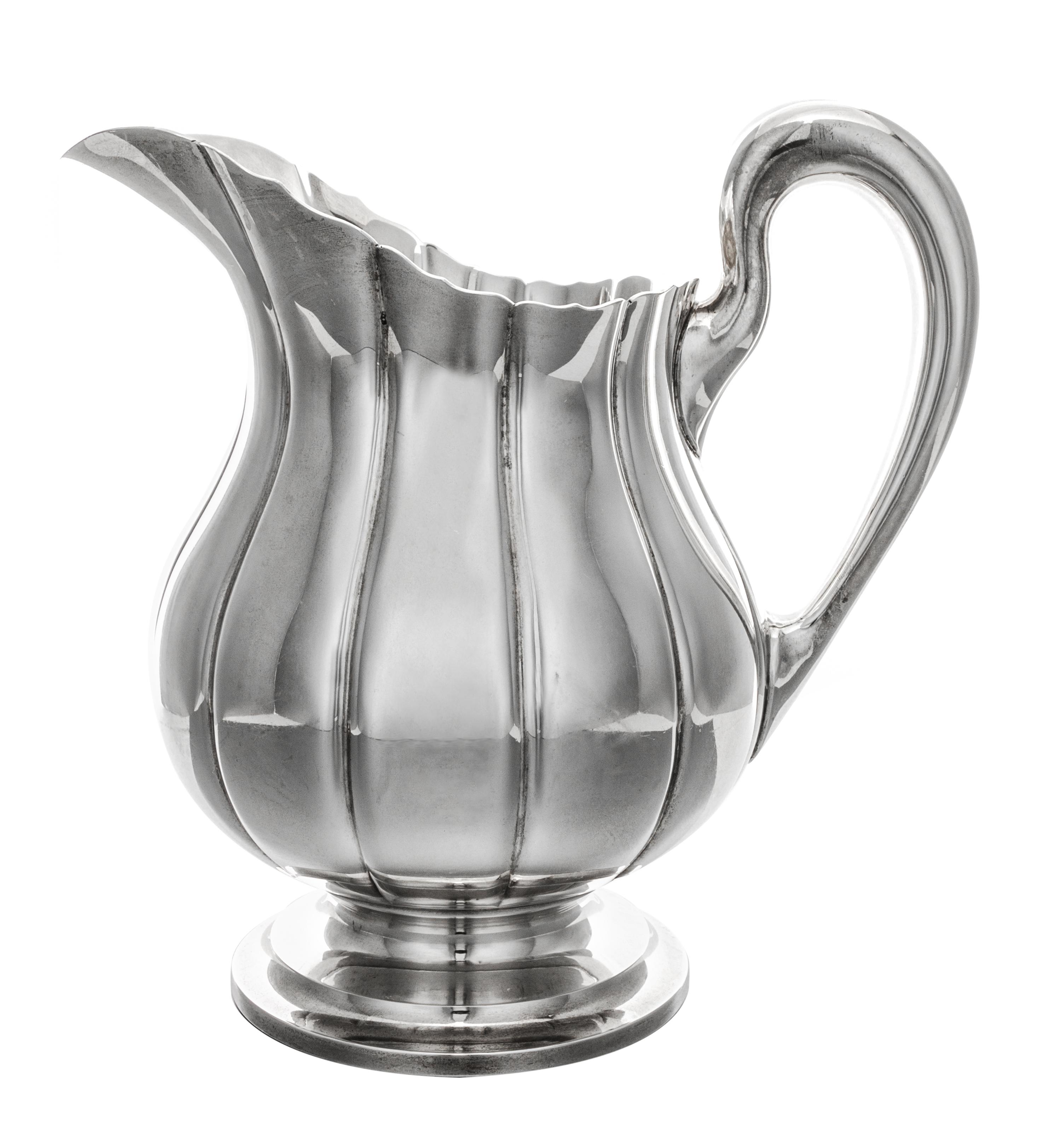An American Silver Water Pitcher, Worden-Munnis Co., Boston, MA, in the Dublin pattern.