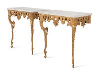 A Pair of North European Rococo Giltwood Marble-Top Console Tables