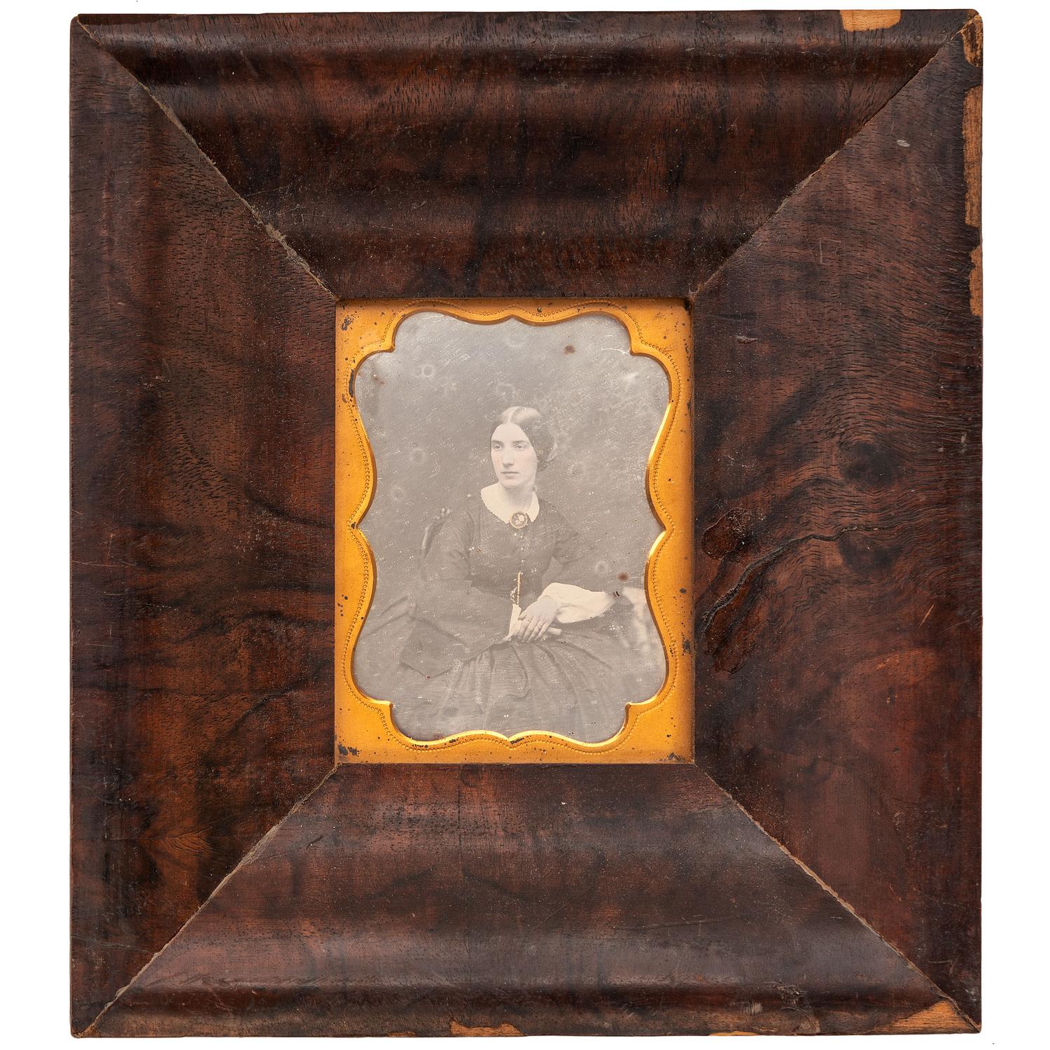 [EARLY PHOTOGRAPHY - PORTRAITURE]. A group of 4 framed daguerreotypes of male and female subjects, including: