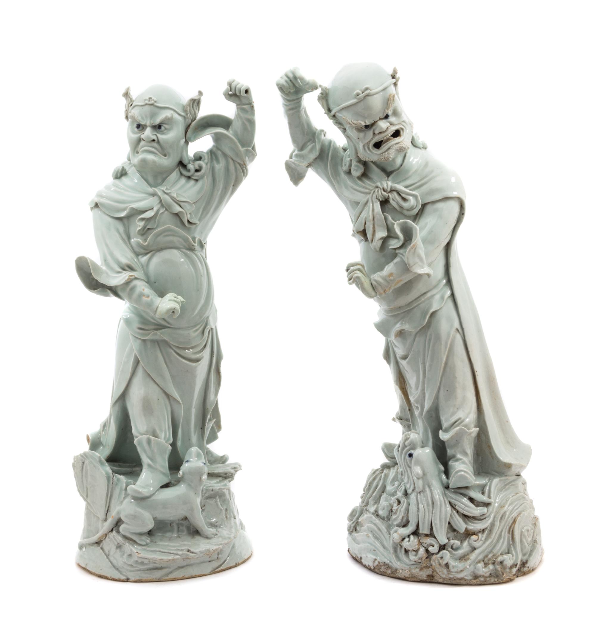 A Pair of Large Chinese Qingbai Porcelain Figures of Guardians MING DYNASTY Height of taller 22 3/8 inches. — MING DYNASTY