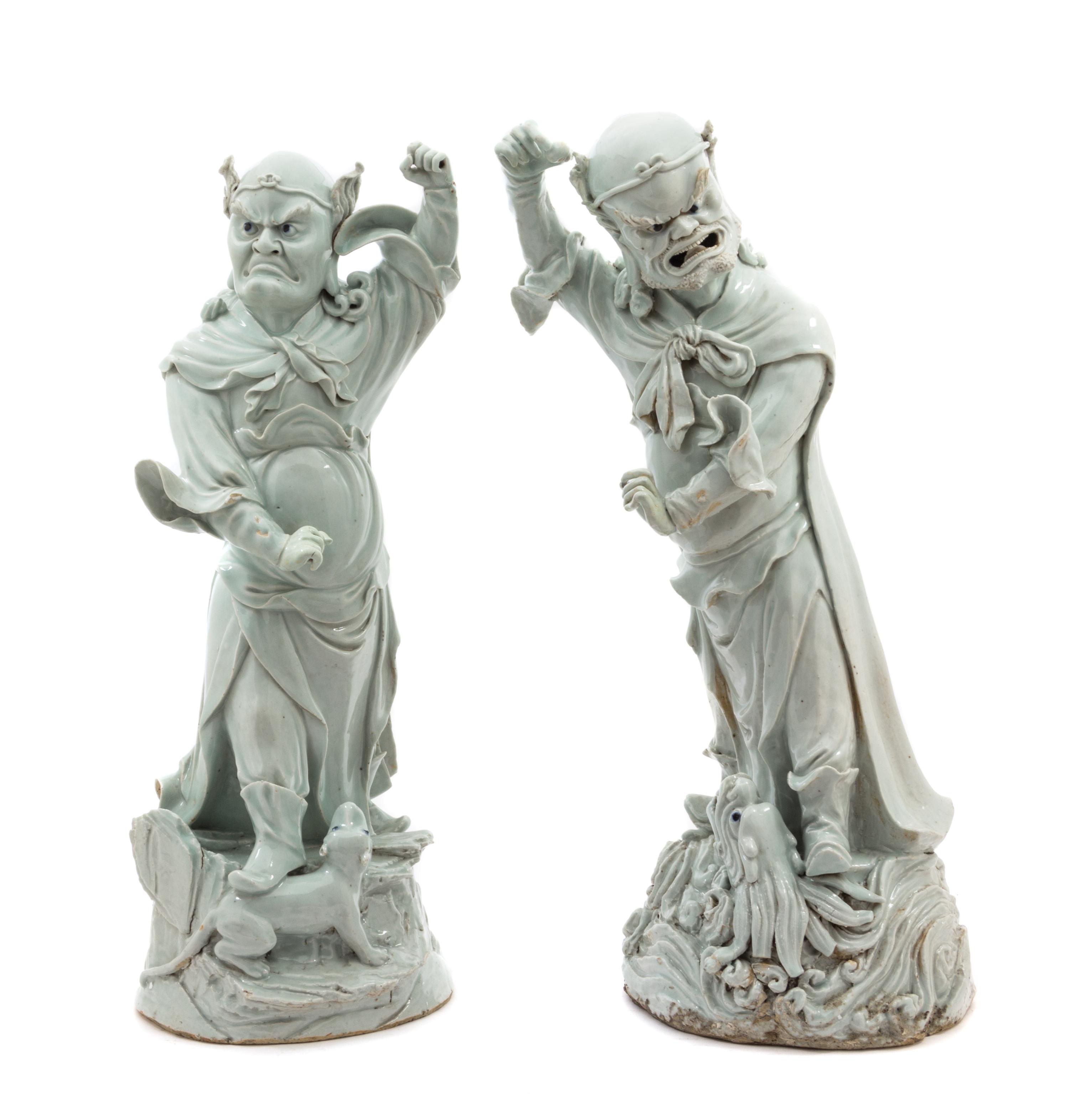 A Pair of Large Chinese Qingbai Porcelain Figures of Guardians MING DYNASTY Height of taller 22 3/8 inches. — MING DYNASTY