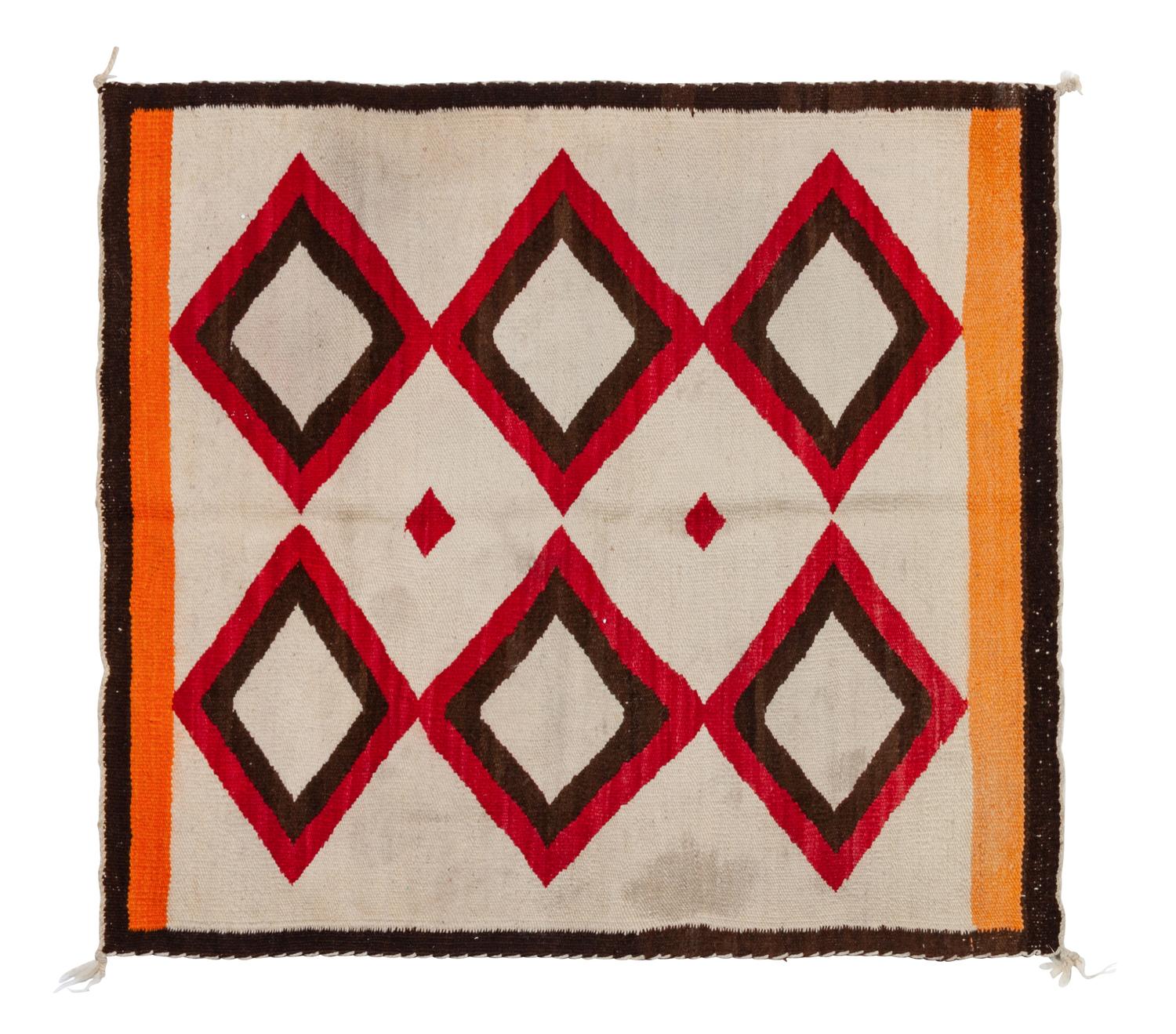 Group of Four Regional Navajo Rugs