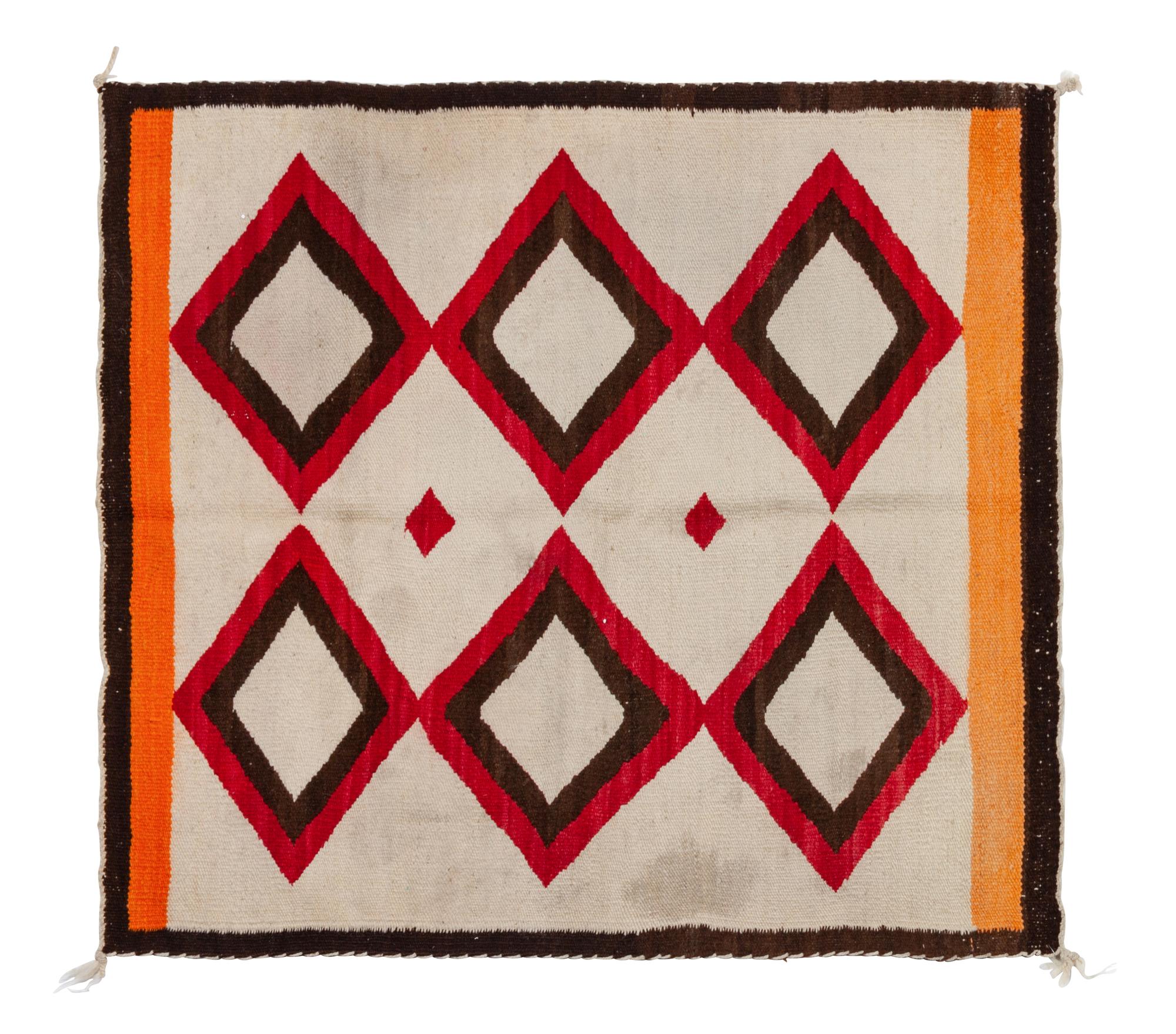 Group of Four Regional Navajo Rugs