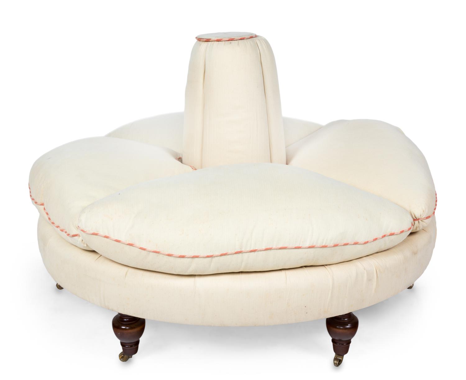 A Victorian Style Mahogany and Upholstered Confidante Height 34 x diameter 58 inches. — 20TH CENTURY