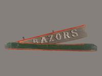A Polychrome Painted Pine Razor Barber Shop Sign