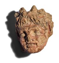 Two Etruscan Terracotta Antefix Fragments