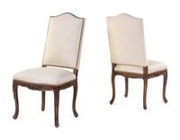 A Pair of Louis XV Style Carved Walnut Side Chairs