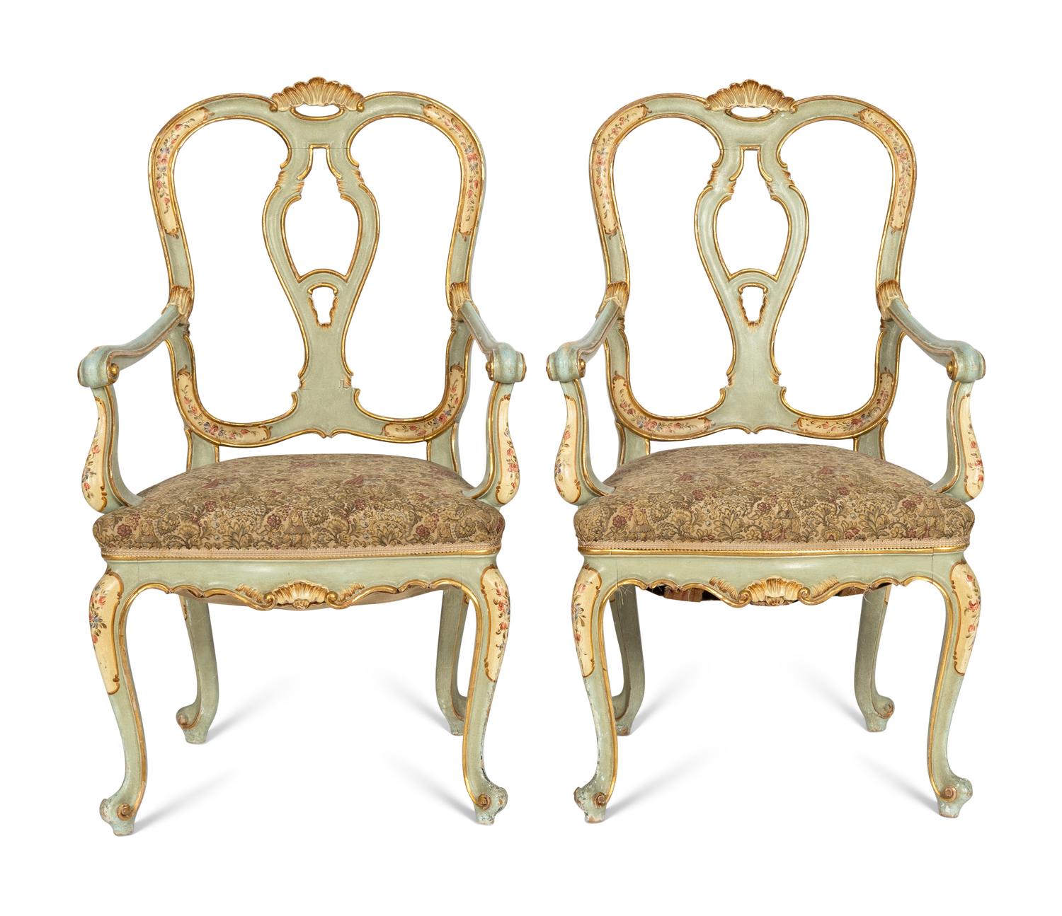 A Pair of Italian Rococo Style Painted and Parcel Gilt Armchairs