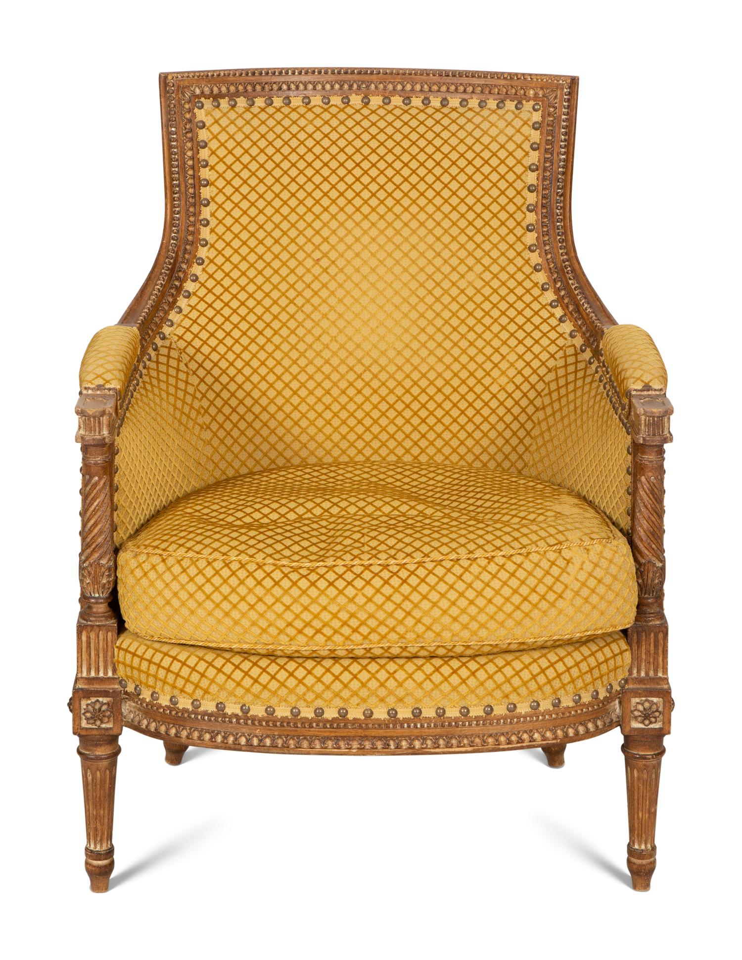 A Louis XVI Style Carved Beech Bergère
