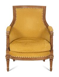 A Louis XVI Style Carved Beech Bergère