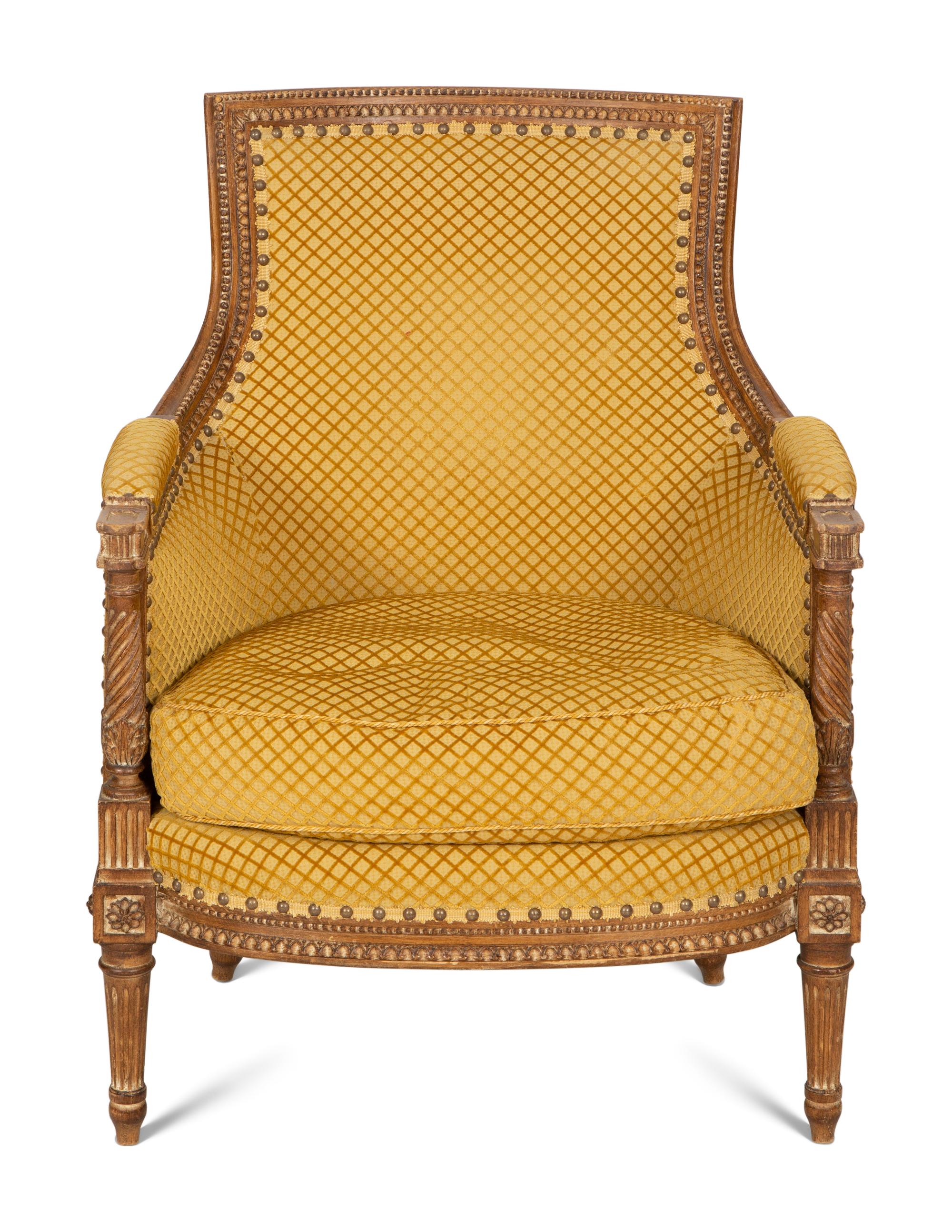 A Louis XVI Style Carved Beech Bergère