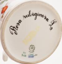 A Royal Copenhagen Flora Danica Chocolate Pot, Height 7 inches.