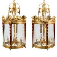 A Pair of Louis XVI Style Gilt Bronze and Mahogany Hall Lanterns