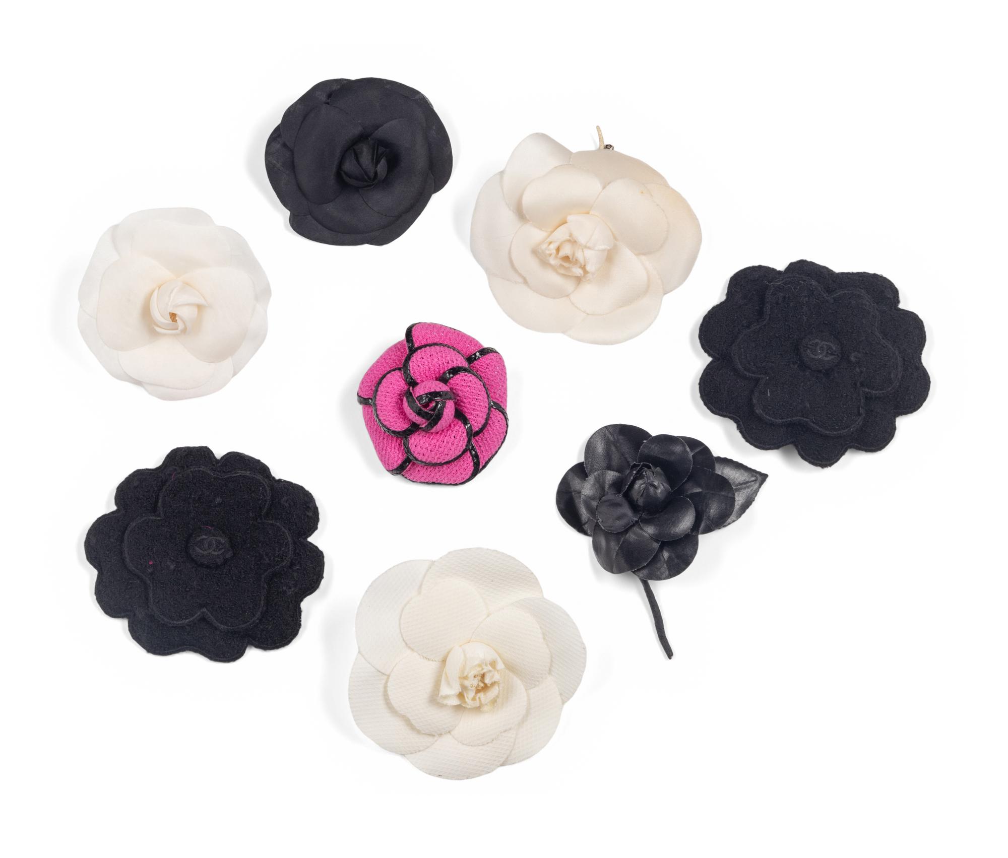 Eight Chanel Camellia Brooches