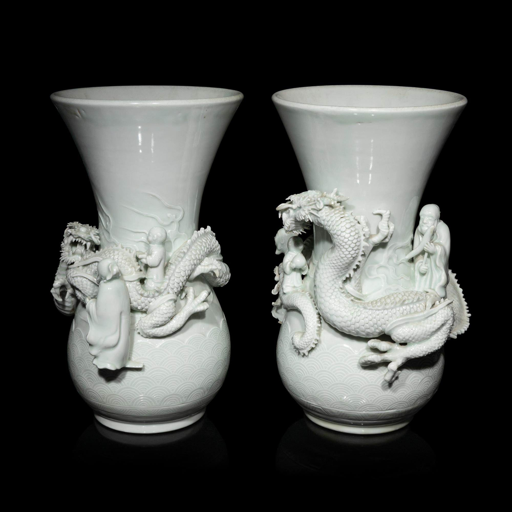 A Pair of Japanese Hirado Molded White Glazed Porcelain Vases, Meiji Period 明治時期 日本鍋島燒白釉龍紋瓶一對