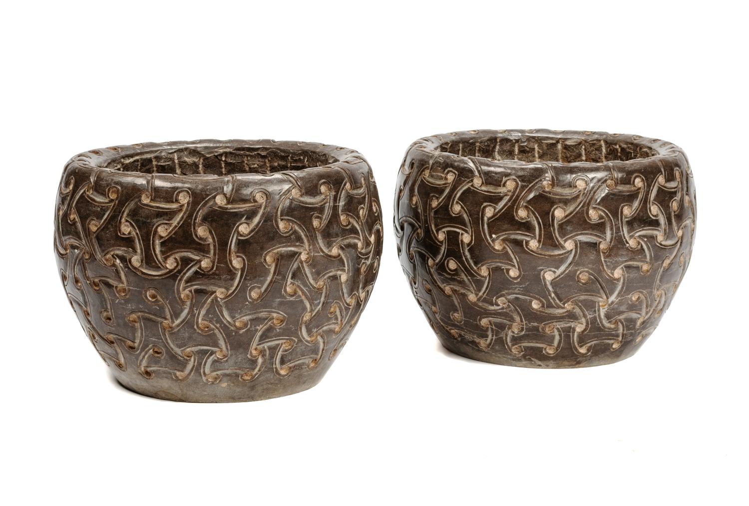 A Pair of Celtic Style Carved Marble Jardinières