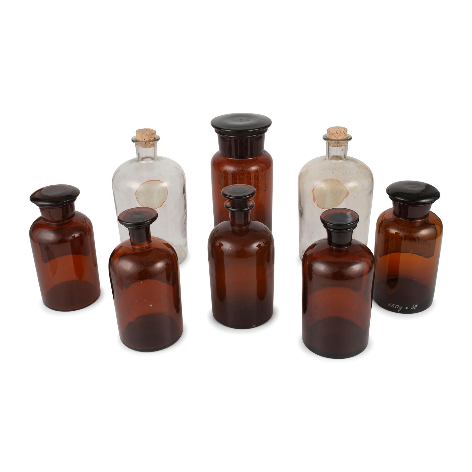 Eight Amber and Colorless Glass Apothecary Jars