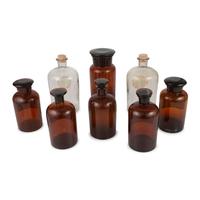Eight Amber and Colorless Glass Apothecary Jars
