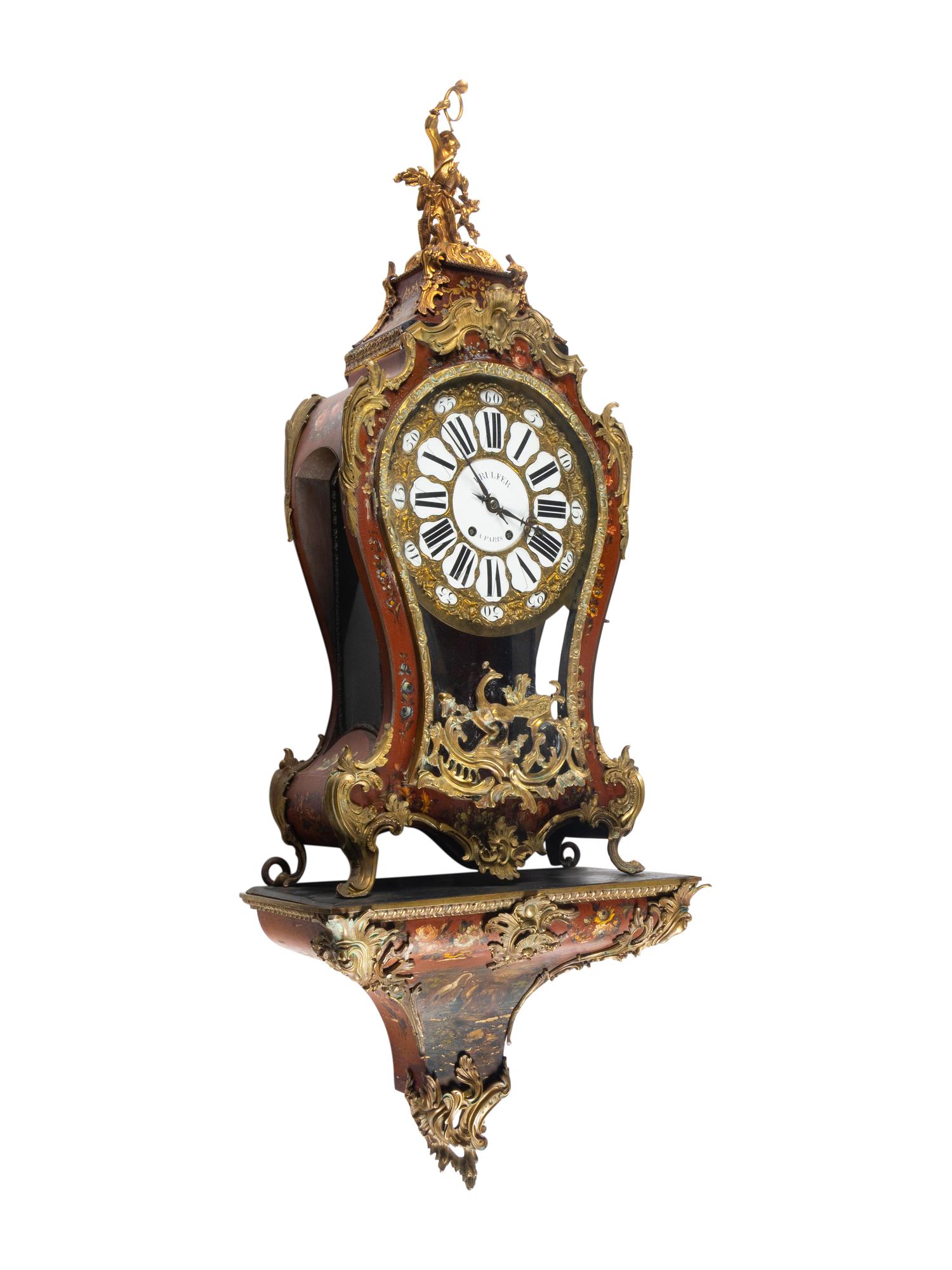 A Louis XV Style Gilt Bronze Mounted Painted Clock and Bracket