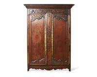 A Louis XVI carved oak armoire, late 18th century