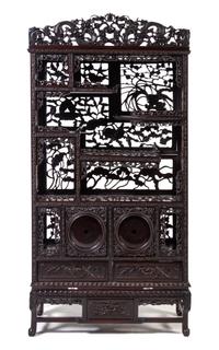 A Japanese Carved Hardwood Etagere Height 65 1/2 x width 32 x depth 11 1/2 inches. — LATE 19TH CENTURY
