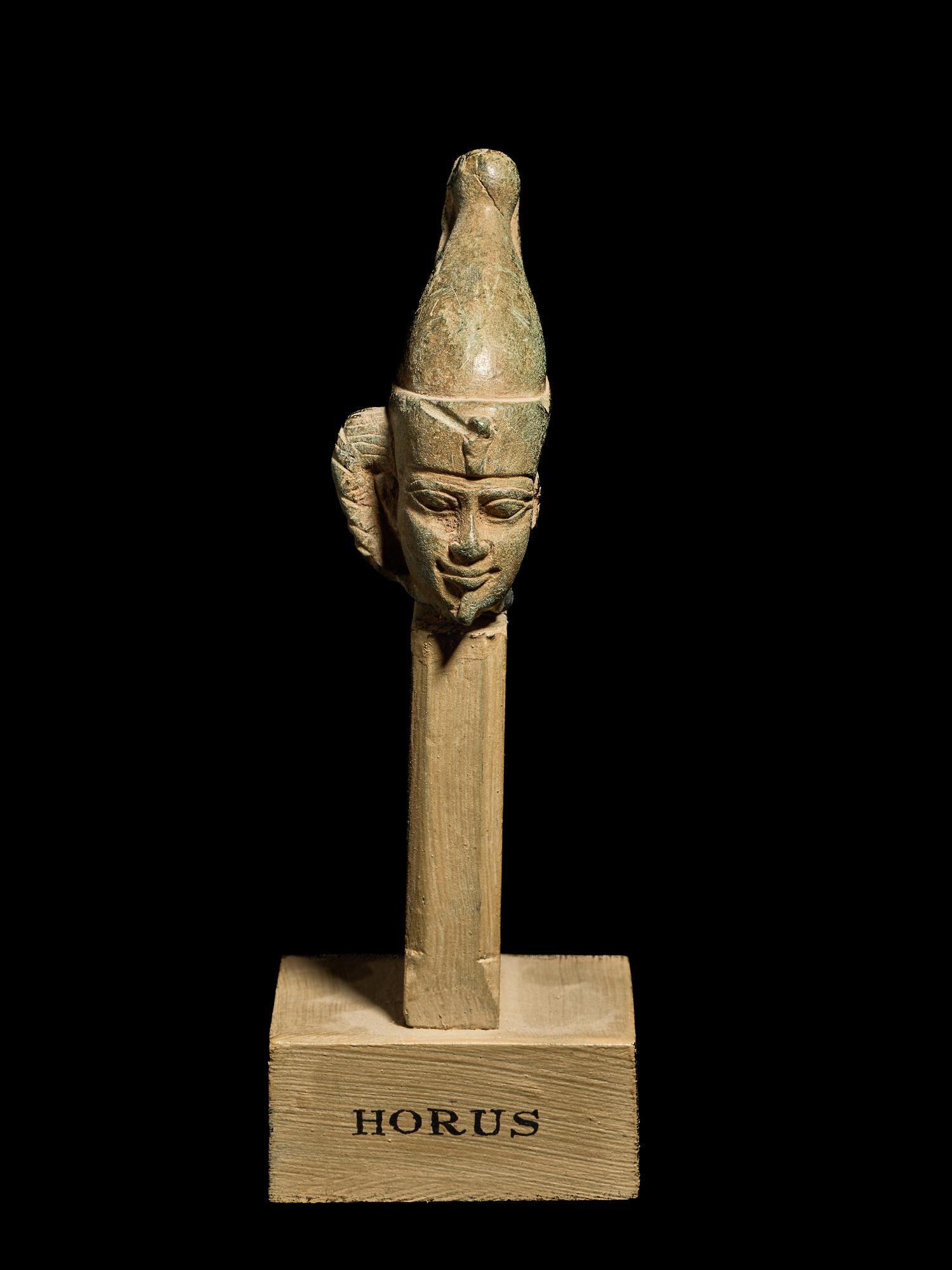 An Egyptian Steatite Head of Horus