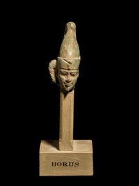 An Egyptian Steatite Head of Horus