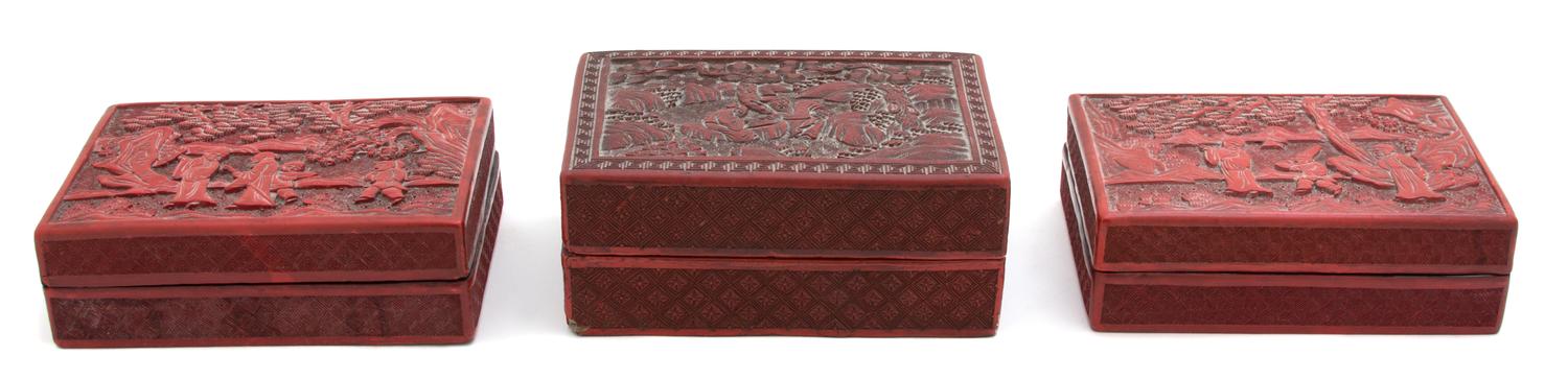 A Group of Three Chinese Carved Cinnabar Covered Boxes