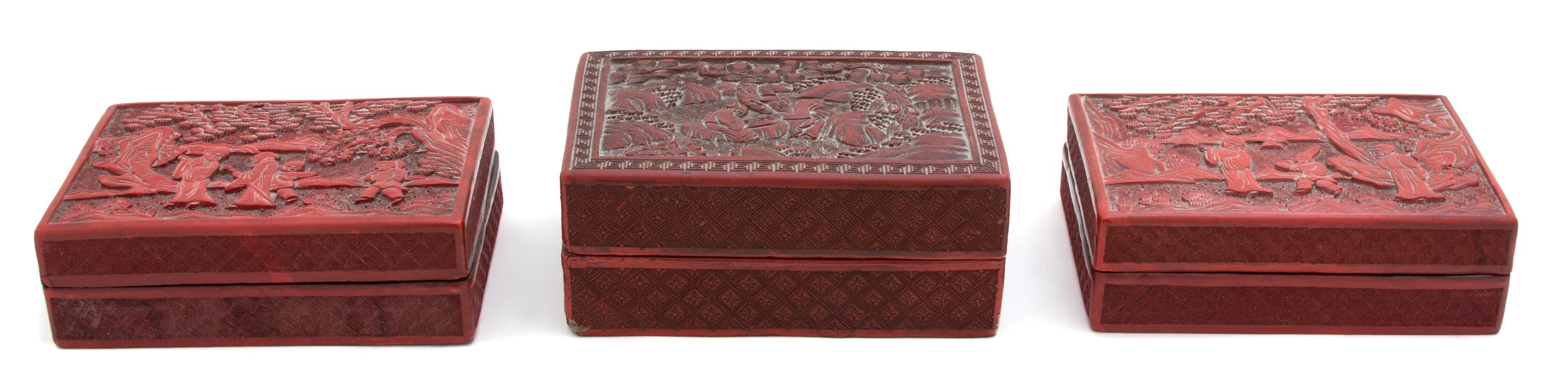 A Group of Three Chinese Carved Cinnabar Covered Boxes