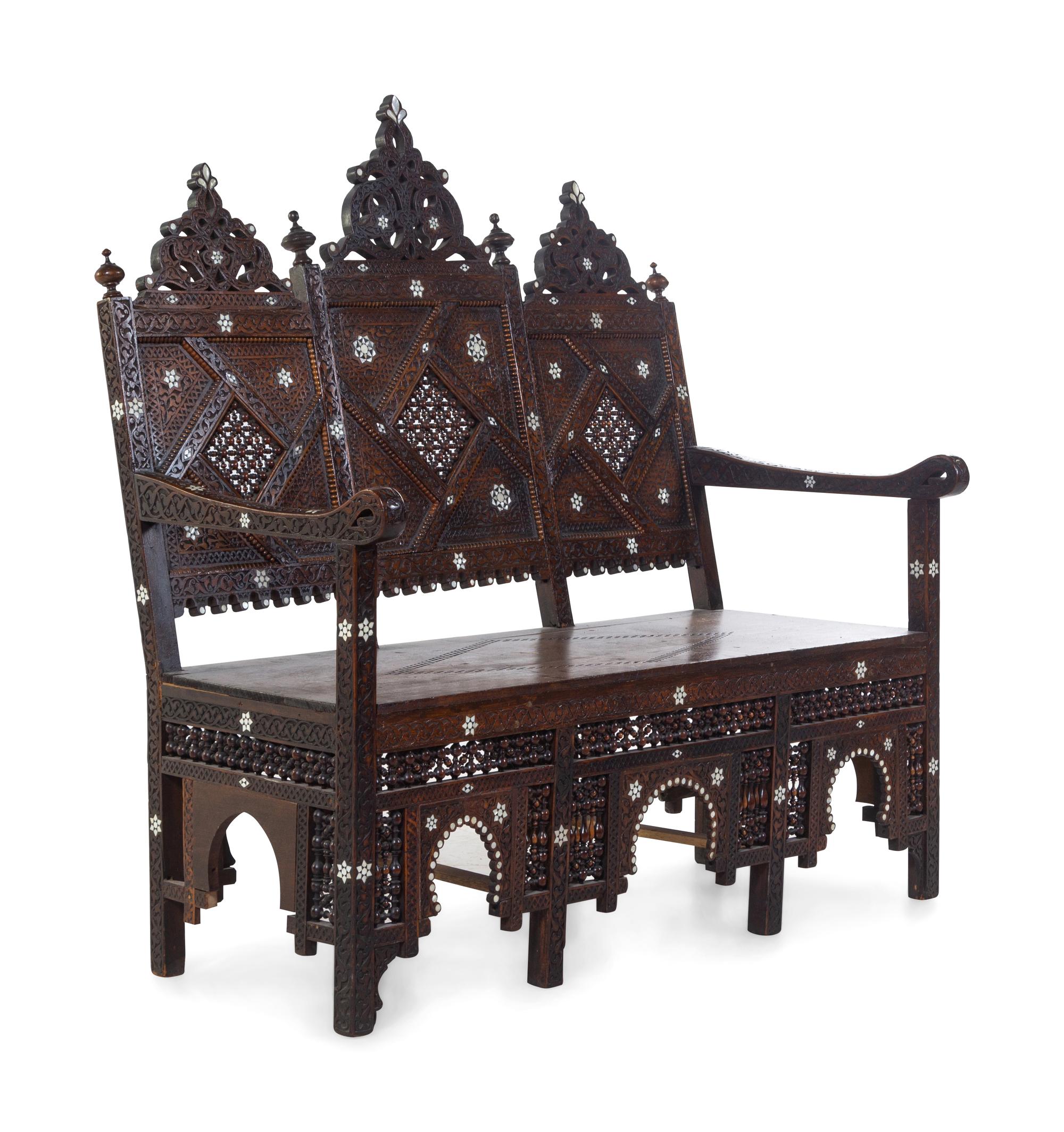 An Egyptian Carved and Inlaid Settee