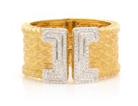 An 18 Karat Gold and Diamond Cuff Bracelet, 90.00 dwts.